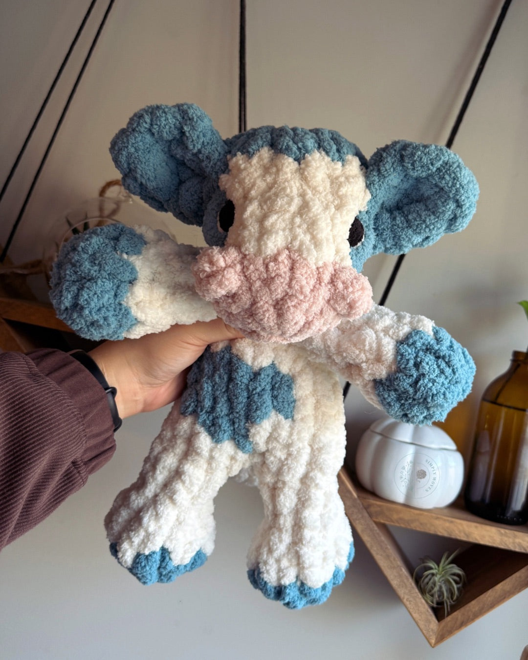 Mini cow snuggler