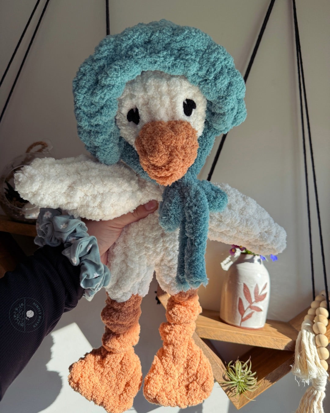 Goose in a bonnet snuggler