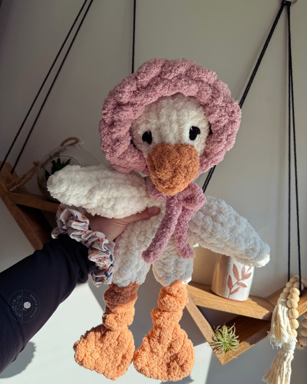 Goose in a bonnet snuggler