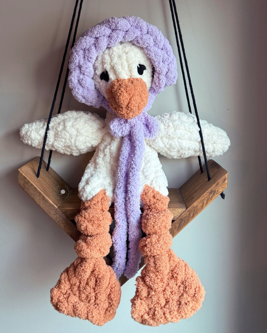 Goose in a bonnet snuggler