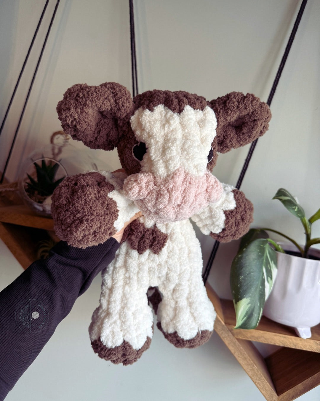 Mini cow snuggler