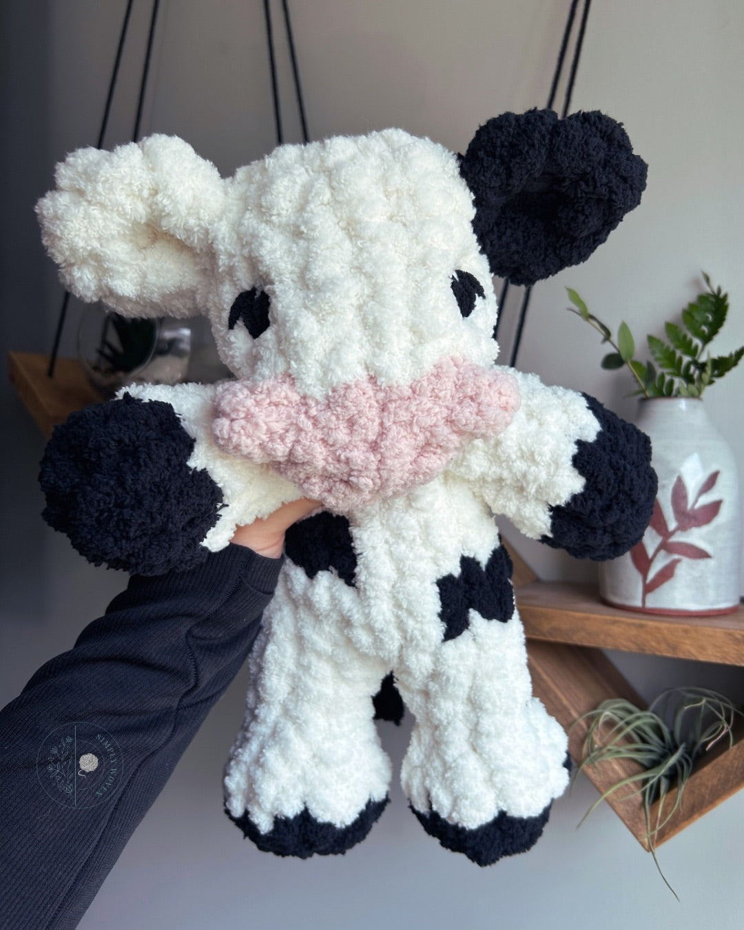 Mini cow snuggler