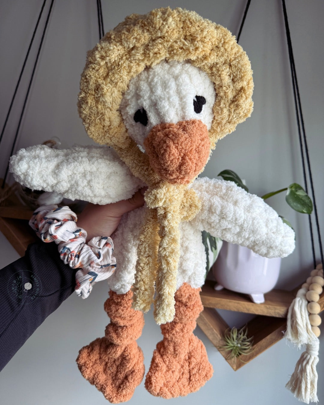 Goose in a bonnet snuggler