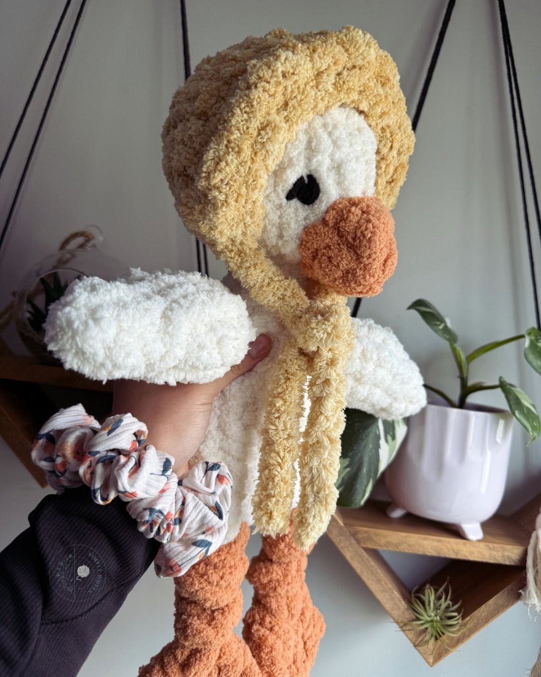 Goose in a bonnet snuggler