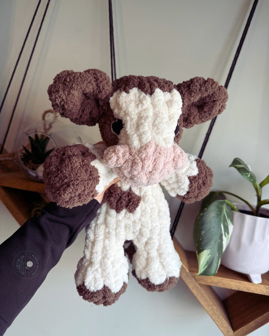 Mini cow snuggler